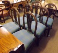 A set of six Mahogany Dining Chairs with arched backs with pierced central splats, blue and green