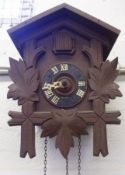 A small mid-20th Century Continental Wall Hanging Cuckoo Clock, with defects