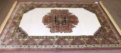 A Caucasian Carpet with cream ground, 2.3m x 1.5m