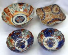 A pair of Japanese Imari small circular Bowls with crimped rims; a further larger circular Imari