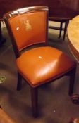 A pair of Royal Norfolk Regiment Commemorative Leather Upholstered Mahogany Framed Dining Chairs,