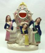 A 19th Century Staffordshire Pocket Watch Stand, modelled as three maidens in dancing poses and