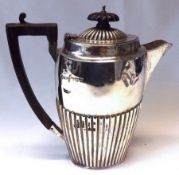 A late Victorian Hot Water Jug of oval tapering form, half fluted decoration, Chester 1900, weighing