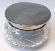 A George VI cut glass and Silver lidded Dressing Table Jar of circular form, the push-on engine