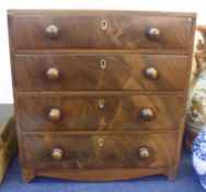 A Mahogany Apprentice’s Chest of four full width graduated drawers on bracket feet, circa late