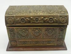 A Brass mounted Oak Stationery Box of rectangular form, the hinged and domed cover with applied
