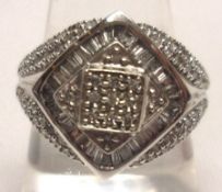 A hallmarked 14ct White Gold all Diamond set Dress Ring in American style