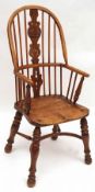 A set of eight good quality Oak Reproduction Windsor style Stick Back Armchairs, by Le Fevre of