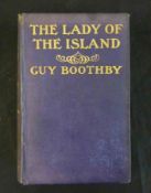 GUY BOOTHBY: THE LADY OF THE ISLAND, ill A T Smith, 1904, 1st edn, 3 pp advts at end, lacks ffep,
