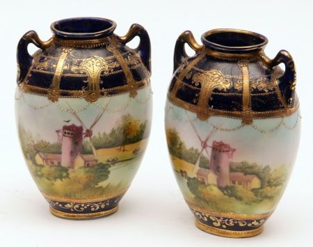 A pair of Noritake two-handled Baluster Vases of ovoid form, decorated with windmill scenes with