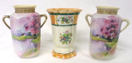 A Noritake Baluster Vase, of shaped hexagonal form, decorated with panels of coloured foliage with