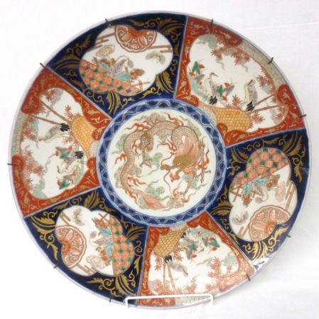 An Imari Charger, of circular form, typically decorated in traditional colours with