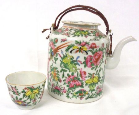 A Canton Famille Rose Cylindrical Covered Teapot, with wirework looped handle and typically