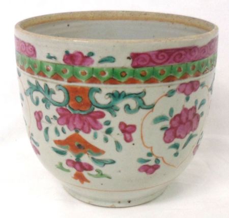 An Oriental Circular Formerly Covered Jar (cover missing), painted in famille rose and verte with