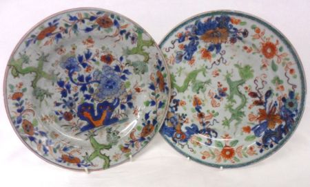 A pair of 18th Century Chinese Plates, painted predominantly in famille verte with dragons amidst