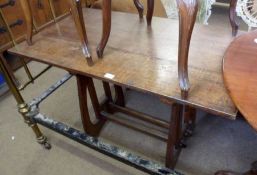 An Oak Arts & Crafts Period Refectory Style Small Table, with triple plank top, raised on pierced