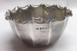 An Edward VII Sugar Bowl, of facetted circular form with wavy rim and polished centre, diameter