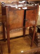 An 18th Century Mahogany Night Cupboard, tray top of two plain doors enclosing cupboard, raised on