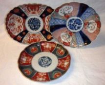 A Japanese Imari Oval Dish; and two further similar Circular Plates, all typically decorated in