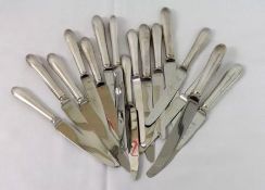 Eight each Stainless Steel bladed and Electroplate handled Dinner and Side Knives, retailed by
