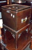 An 18th Century Mahogany former Cellaret, lifting lid with moulded edge and with a zinc or tin-lined