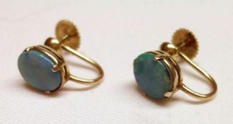 A pair of unmarked yellow metal and Opal Doublet set screw-on Earrings