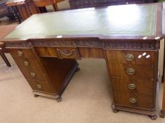 A good quality Reproduction Mahogany Twin Pedestal Desk, with gilt tooled green leather inset,