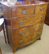 A Victorian Mahogany Bow Fronted Chest of two short and three full width drawers on splayed feet (