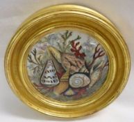 A Prattware Pot Lid depicting seashells and seaweed, fitted into a gilded socle, 4” diameter