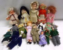 A box containing a small quantity of small modern Dressed Dolls