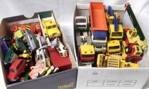 Two boxes containing a quantity of mostly Corgi unboxed Commercial and Construction Vehicles