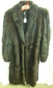 A Ladies 1940s Dark Brown Musquash Fur Coat, bears interior label CC41