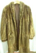 A 1950s Ladies ¾ Length Brown Musquash Fur Coat