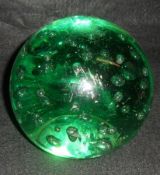 A Nailsea Green Glass Large Dump Paperweight, inset with typical bubble design, 4 ¼” diameter and 4”