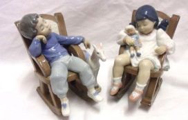 Two Lladro Models of a young boy and girl, each asleep in rocking chairs, he with a toy horse by his