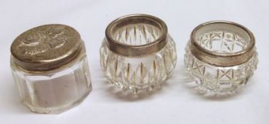 A Mixed Lot comprising: two various Silver Rimmed Clear Glass Open Salts; together with a further