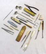 A Mixed Lot comprising: various Folding Knives, Manicure Pieces, Button Hooks, Paper Knife, Ivory