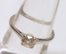 A precious metal Solitaire old cut Diamond Ring, approximately ½ ct