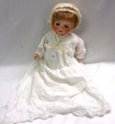 A German Bisque Head Doll, marked Porzellanfabrik Burggrub, Mould No 169, with brown weighted