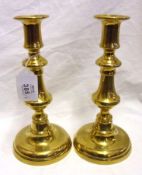 A pair of late 19th Century Brass Candlesticks, of typical baluster form on spreading circular