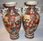 A pair of 20th Century Satsuma large Baluster Vases, decorated in heavy palette with figures in an