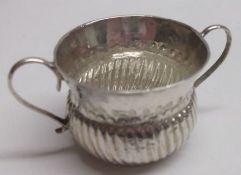 A Queen Anne Miniature Porringer, of waisted circular form with flared rim, hunched border over a