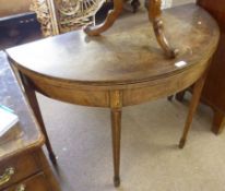 A late 18th/early 19th Century Mahogany Fold Top Card Table of demi-lune form, with boxwood strung