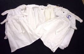 A collection of eight White Cotton Children’s Dresses