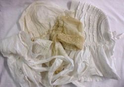 Two boxes containing a collection of mostly 19th Century Ladies Aprons, Bonnets, assorted Lace