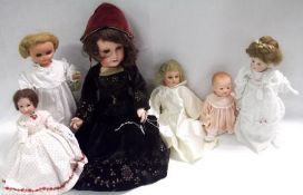 A collection of six early 20th Century Dolls, to include, an all composition French Doll, Bella,