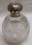 A late Victorian Silver Mounted Toilet Water Bottle, of spherical form with concentric circle cut