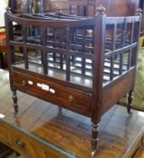 A 19th Century Rosewood Simulated Canterbury, the corners crested with urn finials and with a full