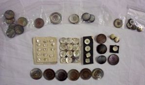 A large container of assorted mostly mother-of-pearl and shell Buttons to include shirt buttons,