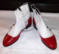 A pair of Shelly’s Red Patent and White Leather Spat Ankle Boots with black button trim detail, size